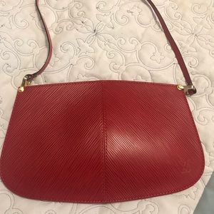 Louis Vuitton red clutch purse/not authentic